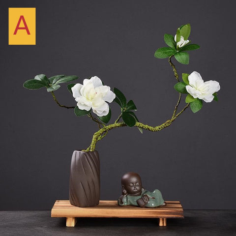 Pequeño monje con flor de Feng Shui