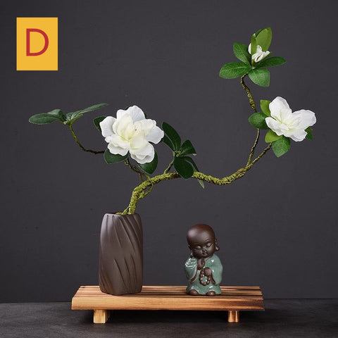 Pequeño monje con flor de Feng Shui