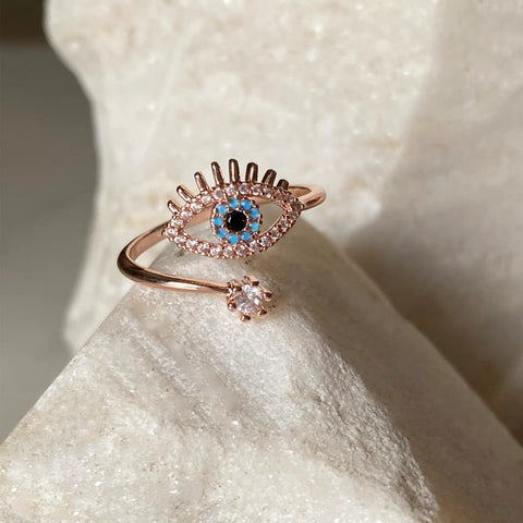 Anillo de oro rosa con protección contra el mal de ojo de tamaño variable