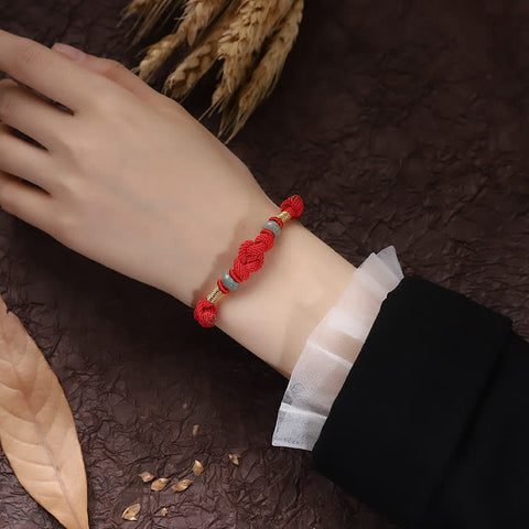 Pulsera de pareja trenzada con nudo de la suerte de Jade, hilo rojo, piedras de Buda