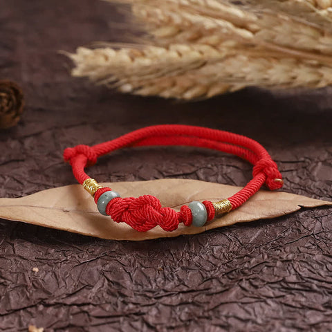 Pulsera de pareja trenzada con nudo de la suerte de Jade, hilo rojo, piedras de Buda