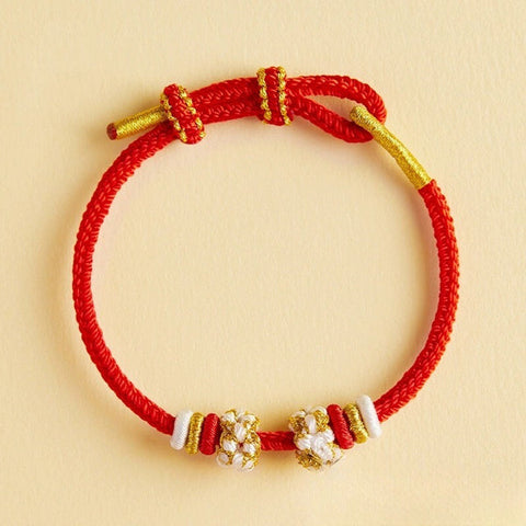 Pulsera de la suerte de moda.