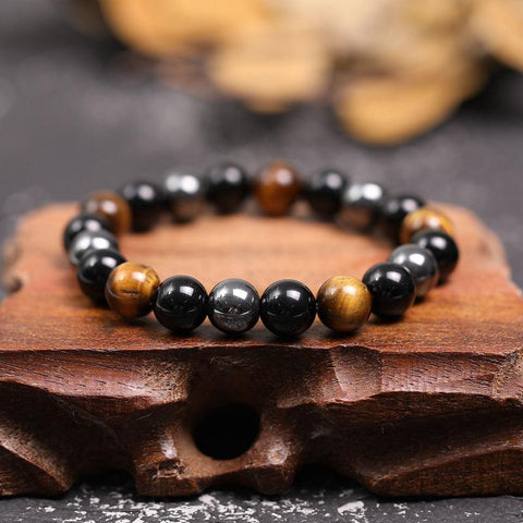 Pulsera de triple protección: ojo de tigre, obsidiana y hematita 