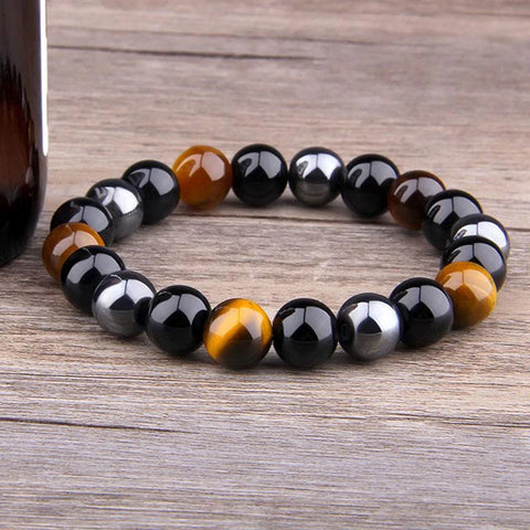 Pulsera de triple protección: ojo de tigre, obsidiana y hematita 