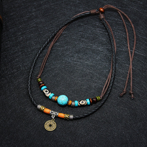 Collar con colgante de turquesa y moneda de la suerte