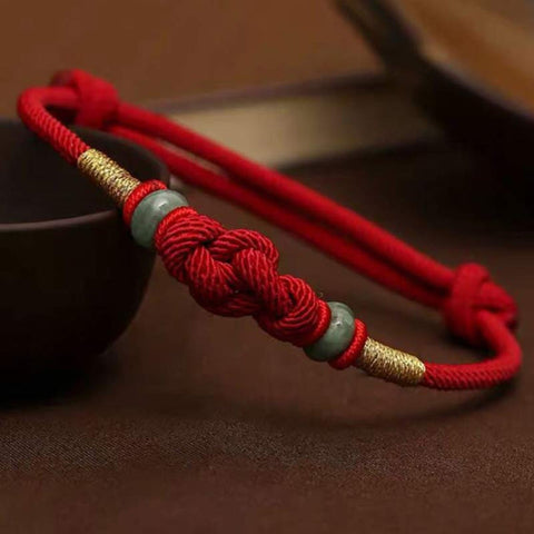 Pulsera de pareja trenzada con nudo de la suerte de Jade, hilo rojo, piedras de Buda